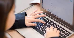 photo of student working on a Chromebook photo of student working on a Chromebook